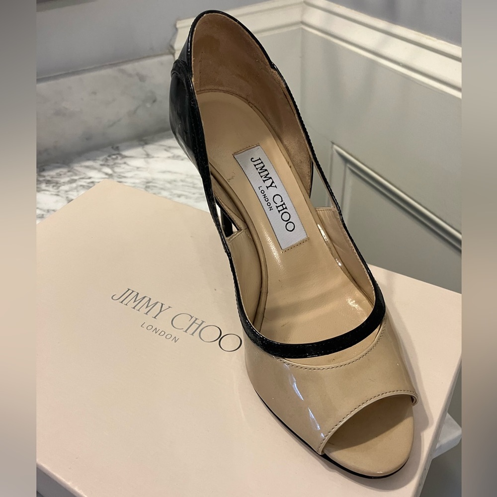 EUC Jimmy Choo heels. Worn 5 times. Stored in bag/box. Beautiful and classic!